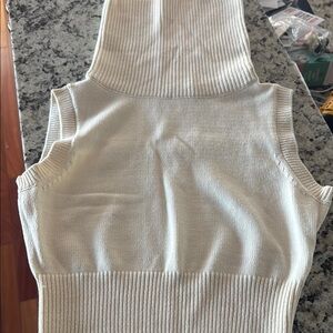 Cream Sleeveless Knit Turtleneck
